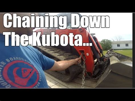 chaining down skid steer|how to chain a youtube trailer.